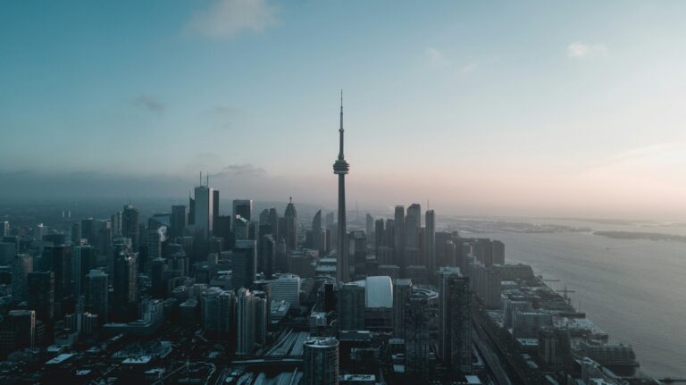 Aerial view of downtown Toronto and the CN Tower at dusk
