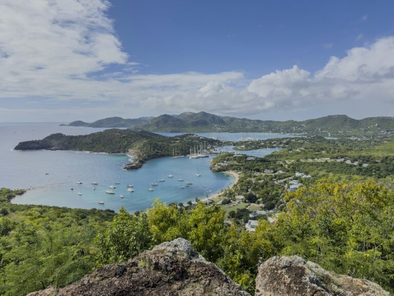 View from Shirley Heights over English Harbour in Antigua with yachts anchored in turquoise bays, home of Antigua and Barbuda citizenship by investment