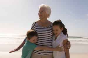 A multi-generation family embracing, the Parent visa subclass 103 reunites parents with their Australian children permanently