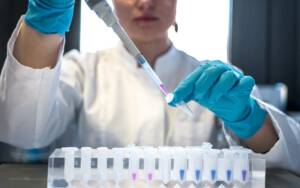 A researcher working with samples in a laboratory